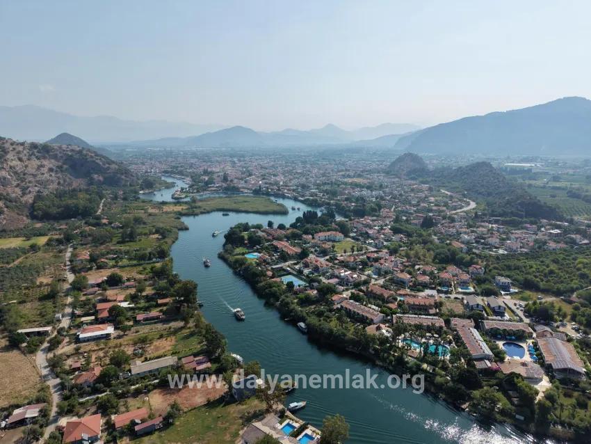 Село Köyceğiz в районе Çandır, у канала, 20.000м2 продажа поля